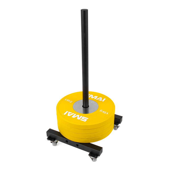 A black sled-style bumper plate storage stacker with a vertical handlebar is designed to be portable, neatly arranged with four 15 kg yellow Olympic bumper plates set against a white background. The brand "SMAI" is prominently displayed on the plates.