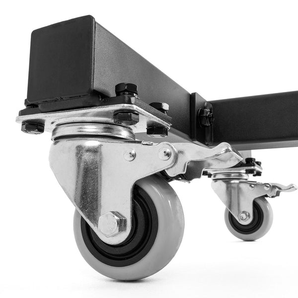 Close-up view of two metal swivel casters with gray wheels attached to a black metal frame, resembling the SMAI Bumper Plate Storage Stacker with Wheels.