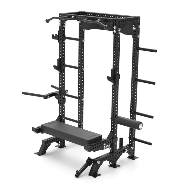 The SMAI Half Rack Ultimate Package from the Vanta Series features adjustable components like a pull-up bar and squat stands, along with weight storage pegs. It includes a flat bench at its base, making it ideal for gym exercises and efficient weight tracking during strength training.