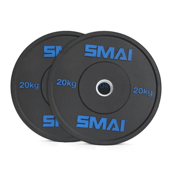 Two black HD Bumper Plates marked "Sale Item" and weighing "20 kg" each are stacked slightly offset, perfect for Olympic lifting or CrossFit. The plates have a central hole for easy mounting on a barbell.