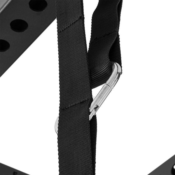 Close-up of SMAI's Wooden Gym Rings - Easy Straps: a black adjustable strap with a silver metal carabiner attached to a perforated metal frame. The image highlights the carabiner and durable fabric, perfect for securing gym rings.