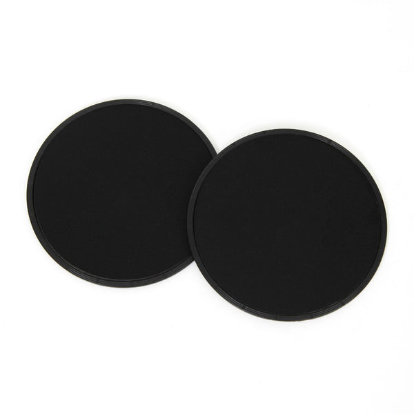 The Ab Slide Discs (Pair) by SMAI are two round, black rubber pads with neoprene surfaces, shown overlapping on a white background, designed for barbell support or protection during exercises.