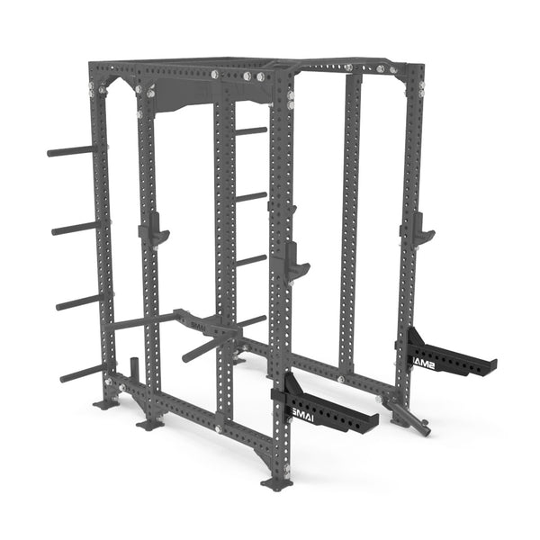 A black, heavy-duty power rack from SMAI includes a quick-release safety pin system and the Vanta Series Safety Spotter Arms. Equipped with multiple weight storage pegs, adjustable barbell holders, and nylon protection on the safety catches, it's ideal for gym strength training exercises such as squats and bench presses.