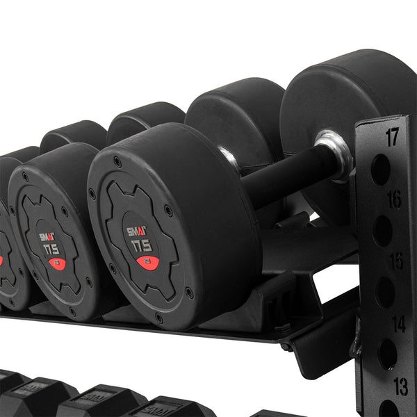 A close-up of a rack featuring black dumbbells with red and silver detailing, each branded "SMAI T15," showcases the sleek 1.1m Dumbbell Storage Shelf from the Vanta Series. This storage solution by SMAI offers easy weight identification with side numbering and is crafted from durable 11-gauge steel for lasting quality.