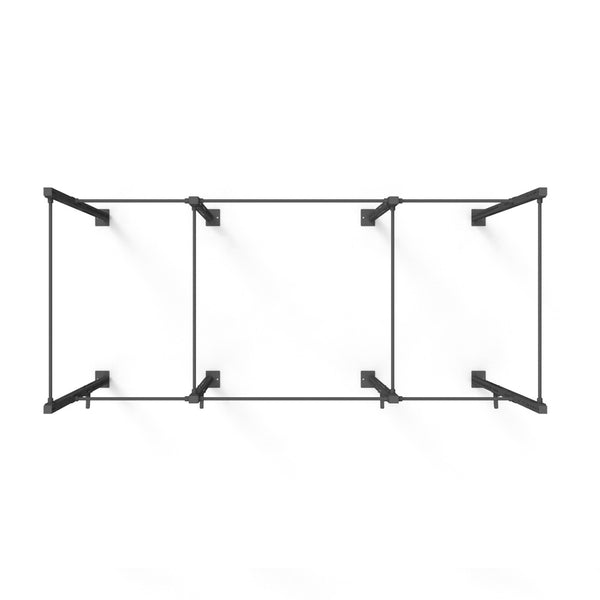 Introducing the Rig - 4 Squat Cell with Bridge by No Sync To Channel Engine: A ceiling-mounted black metal frame featuring three open rectangular sections, constructed from steel tubing and finished with a durable powder coat. This design embodies a minimalistic, industrial style, providing a modular solution for hanging items or supporting structures.