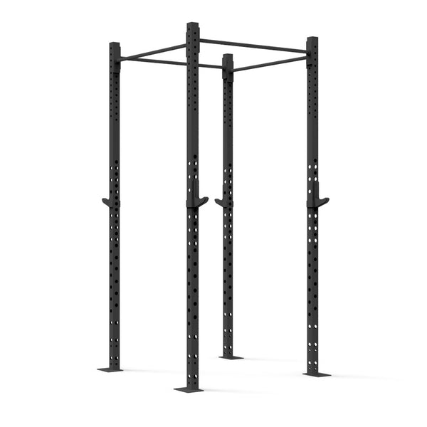 The Rig - 2 Squats Cells - X-Frame by No Sync To Channel Engine is a black metal power rack featuring four vertical posts made from high-gauge steel tubing. It is perfect for weightlifting and strength training exercises and ideal for use in commercial gyms. The rack includes adjustable safety catches as well as a pull-up bar on top.