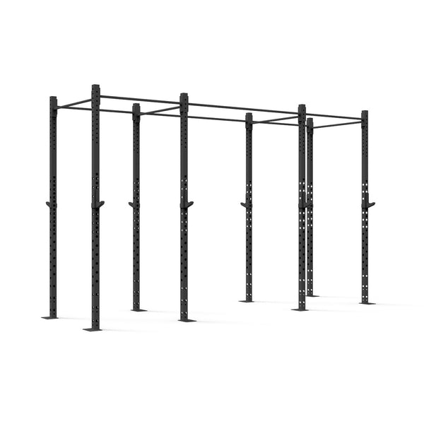 The Rig - 4 Squat Cells by SMAI is a black steel multi-bay power rack with a sleek modular design featuring multiple uprights and horizontal bars, ideal for weightlifting and fitness exercises. This piece of commercial equipment is displayed against a plain white background.