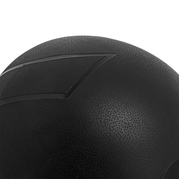 Close-up of the textured, black spherical Slam Ball from the SMAI Slam Ball Monster Set (60kg, 70kg & 80kg), featuring subtle embossed geometric patterns. The durable rubber construction is enhanced by the lighting, adding depth and dimensionality, making it ideal for strongman training.