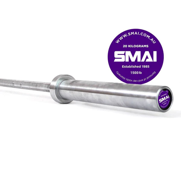 A close-up shot showcases a steel barbell with a circular purple end cap inscribed with "Sale Item, 20 kilograms, Established 1985, 1500 lb." Perfect for Olympic lifting and CrossFit enthusiasts, the design of the HD Bumper Plate Set shines against a plain white background. For more information, visit www.smai.com.au.