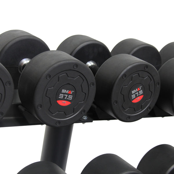 A sleek, modern set of commercial dumbbells is neatly displayed on a rack labeled "SMAI." In this gym setting, the black weights showcase 37.5 kg, enhancing the appeal of premium gym equipment.